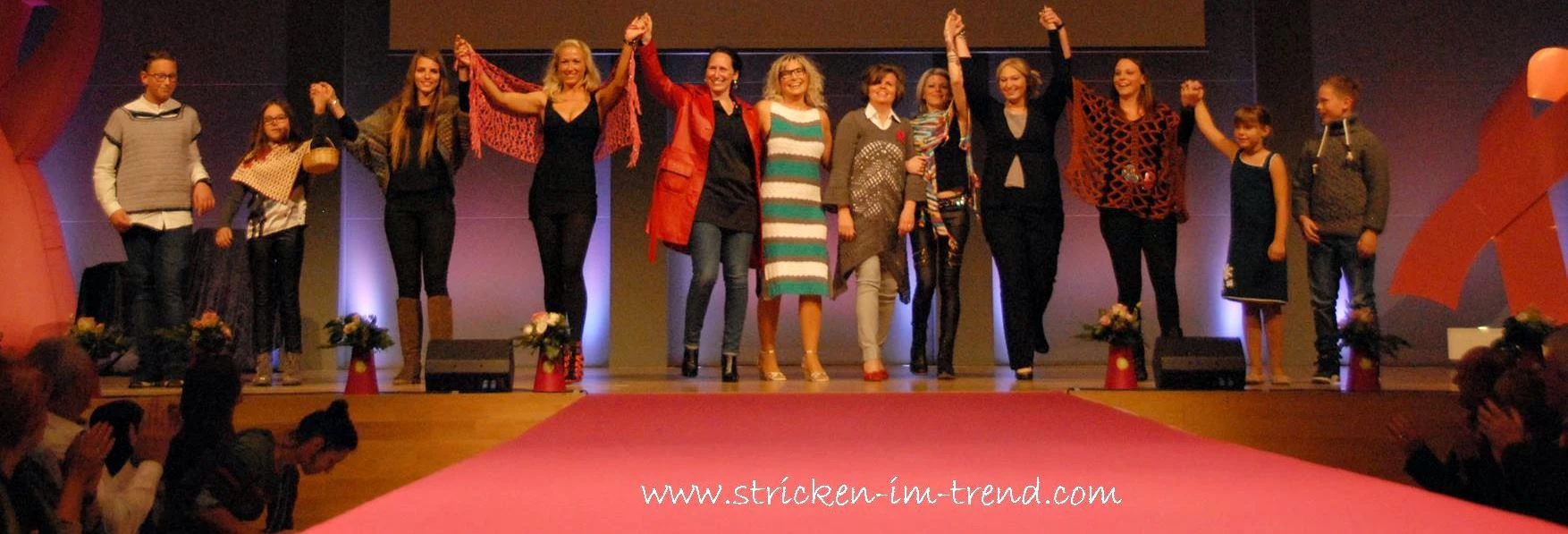 Modelle und Beteiligte gemeinsam bei der Veranstaltung